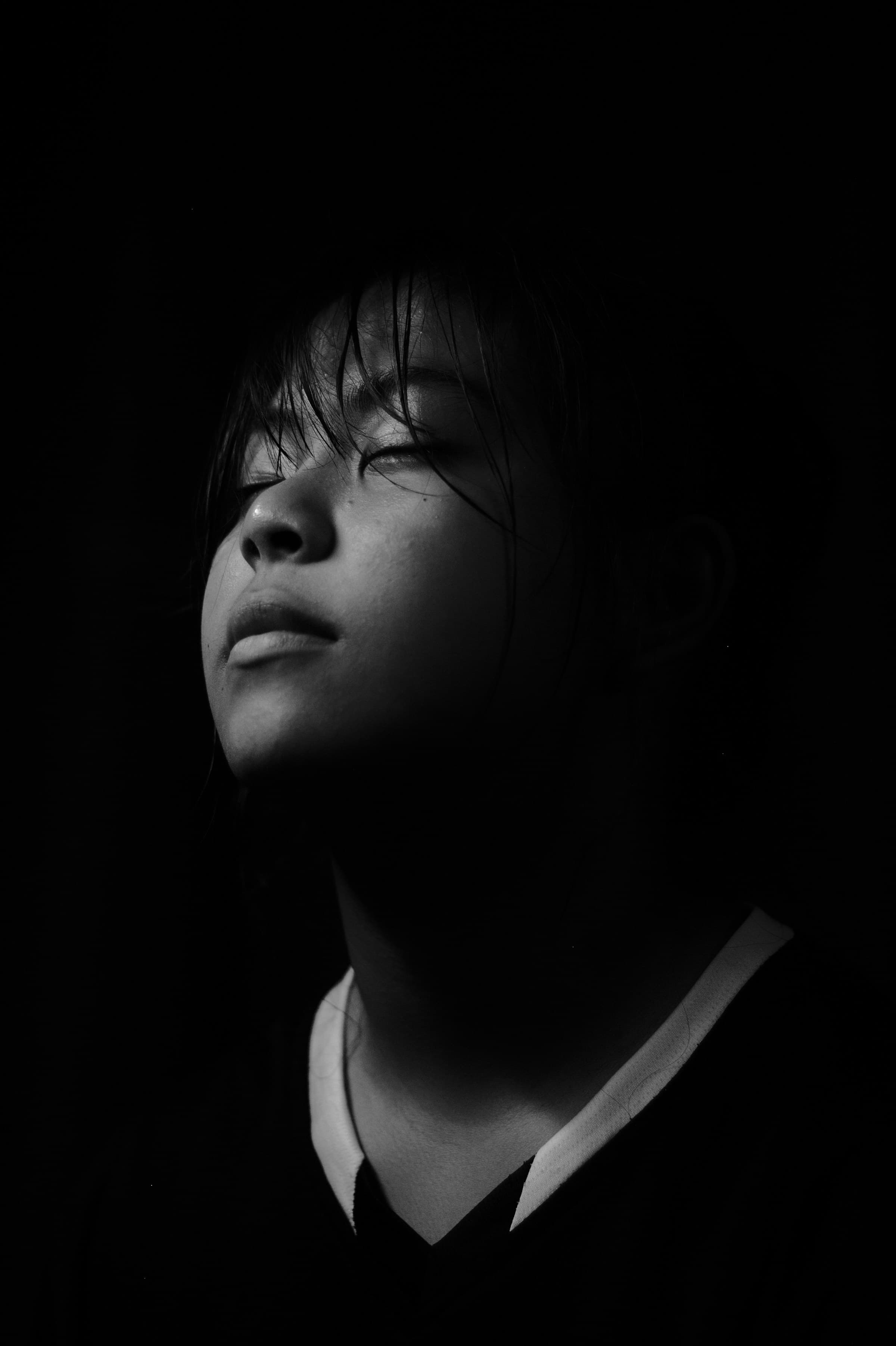 Dramatic black-and-white portrait of Sai Kiran